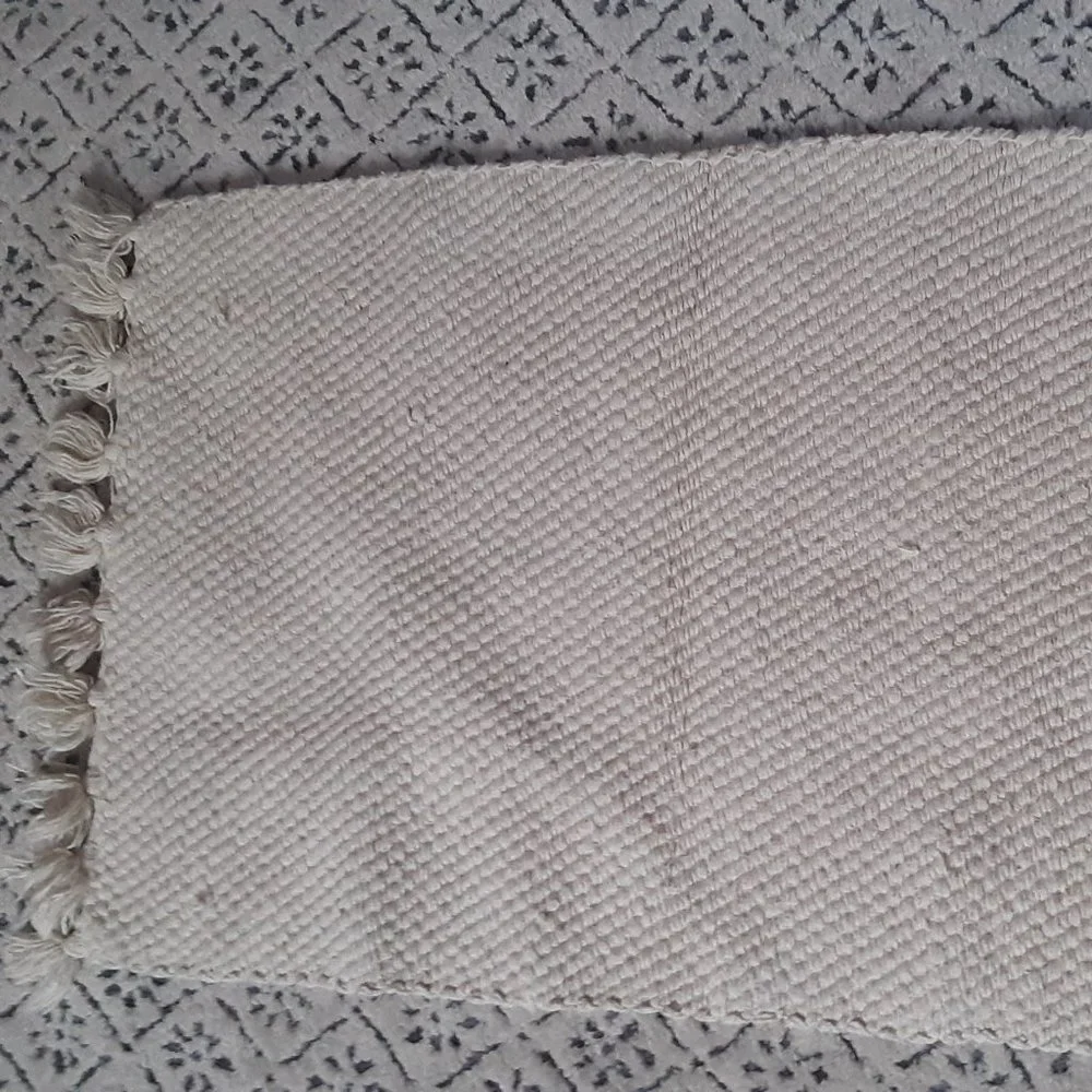 Pair of IKEA Approx. 2x3 Off-White Throw Rugs with Tassels